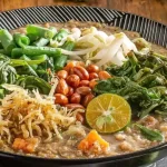 Tak Sekadar Pedas, Bubur Tradisional Melayu Sambas Ini Kaya Rempah